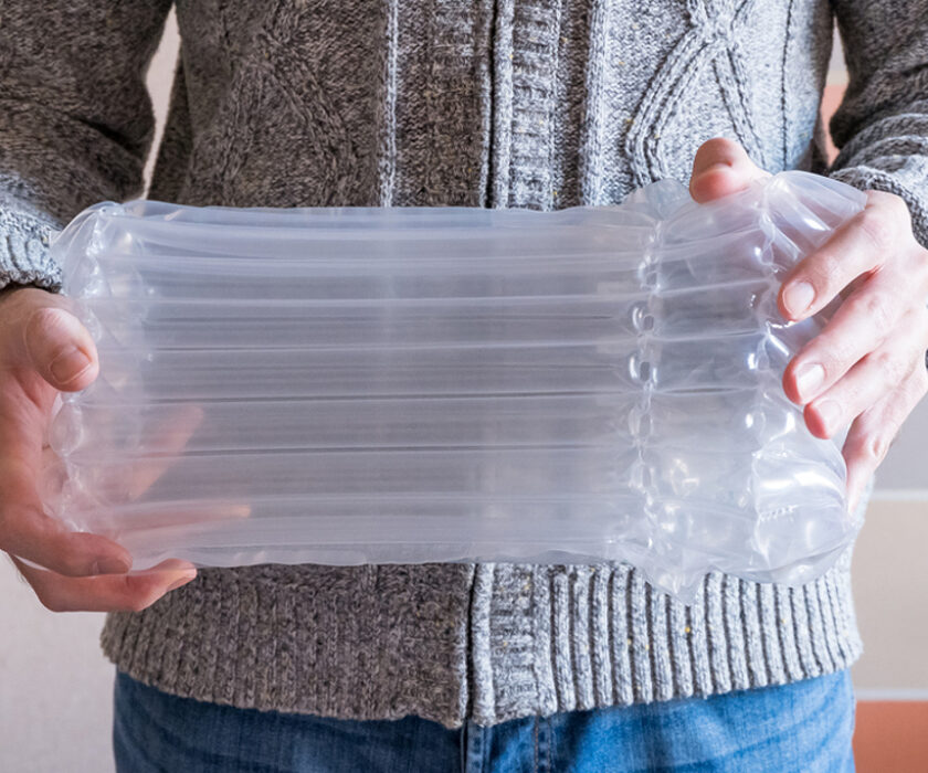 translucent air packaging hands hold, plastic packaging